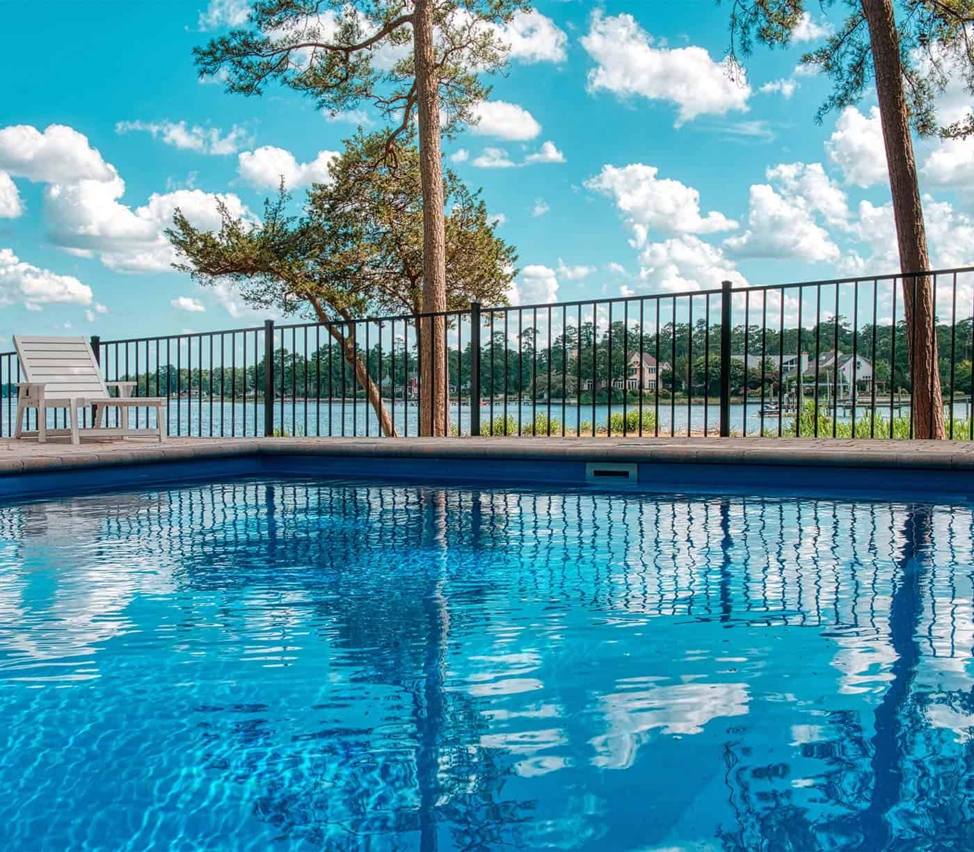 An image of a metal fence designed to protect a pool