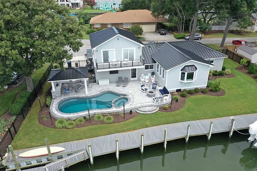 Virginia Beach house with a swimming pool on the water