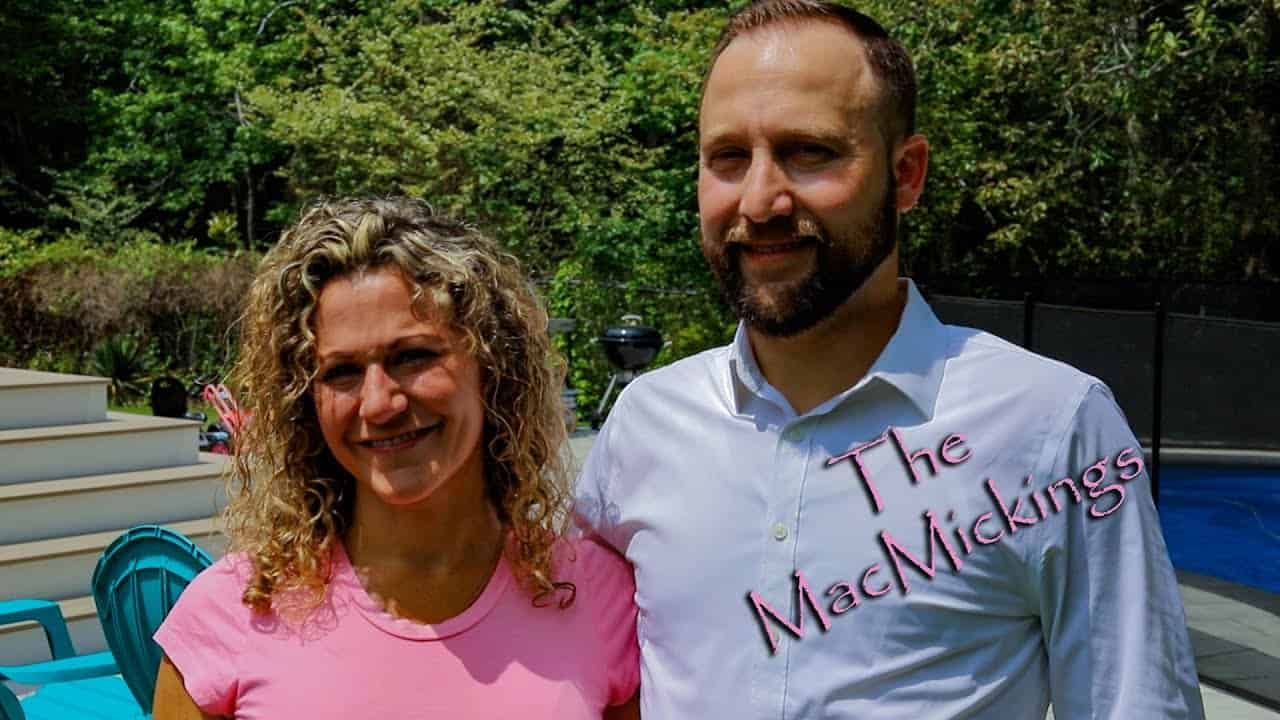 Woman standing next to man