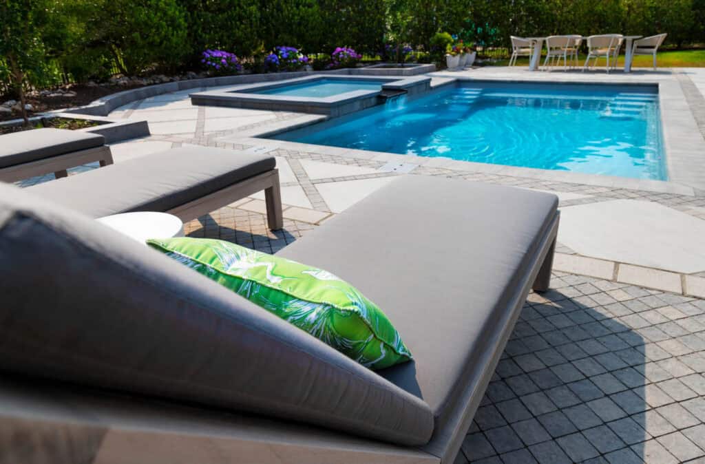 Imagine Pools Freedom 23' Fiberglass Pool and Mercury Tanning Ledge in Ice Silver, Featuring Gold Jandy Equipment Package with 1.85 Hp Variable Speed Pump, Cv 340 Cartridge Filter, Saltwater Chlorination, Iaqualink Automation, and Three Infinite Watercolors Led Lights.