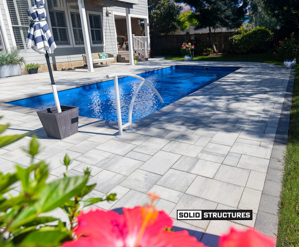 Fiberglass Pool Installation of a Imagine Pools Freedom 30 Foot Swimming Pool by Solid Structures Virginia Beach Va