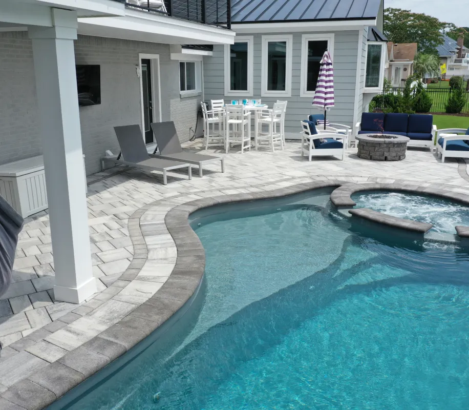 Custom Curved Pool Deck and Coping by Solid Structures.